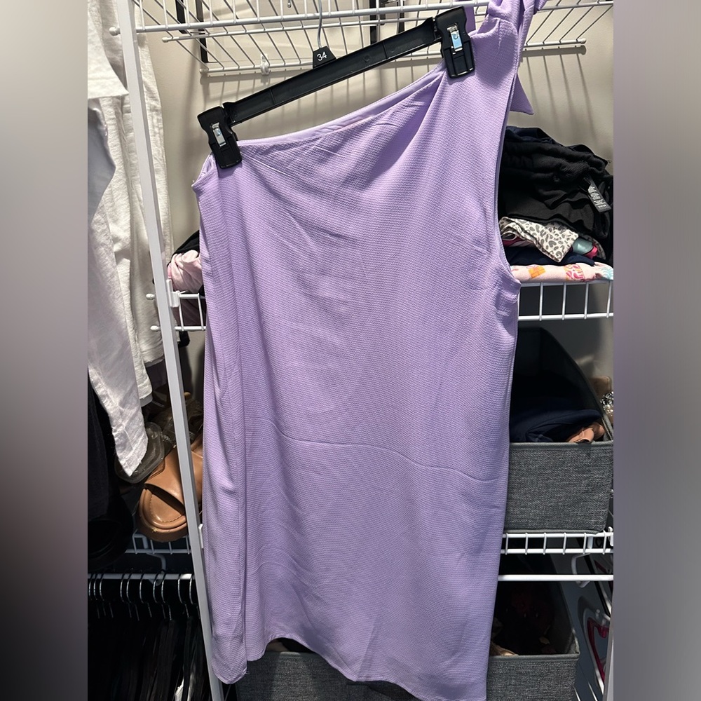 Lavender one shoulder dress.